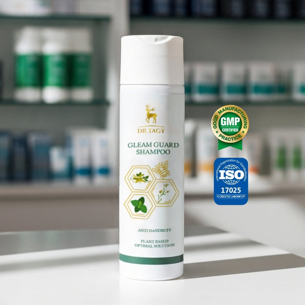 Dr. Tagy Gleam Guard Shampoo bottle with anti-hair loss and strengthening formula, placed on a white surface with GMP and ISO certification logos in the background.