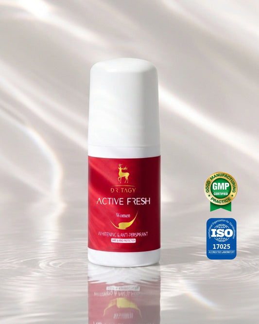 Dr. Tagy ACTIVE FRESH Brightening Roll-On Care for Women — red label bottle with white cap and certification logos (GMP, ISO) on a reflective background, showcasing its formula completely free from harmful aluminum and designed for underarm tone brightening care rather than traditional deodorant use.
