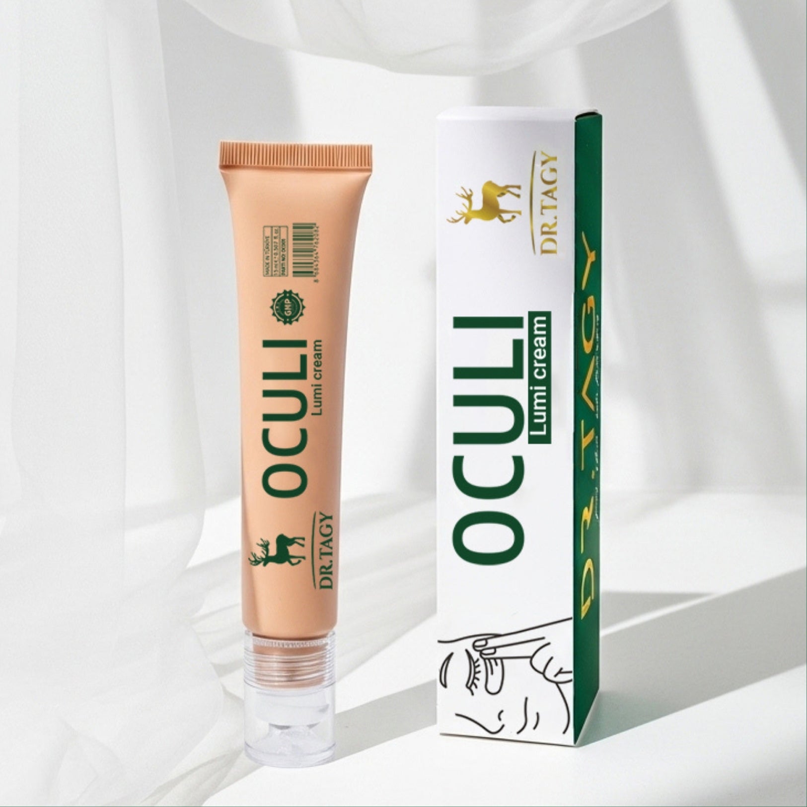 DR TAGY Oculi Lumi Cream under-eye tube displayed with its packaging on a soft white background.