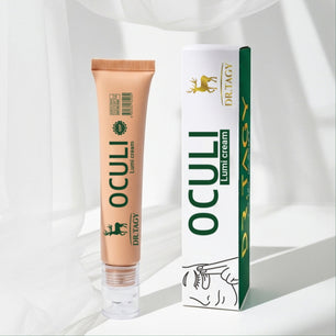 DR TAGY Oculi Lumi Cream under-eye tube displayed with its packaging on a soft white background.